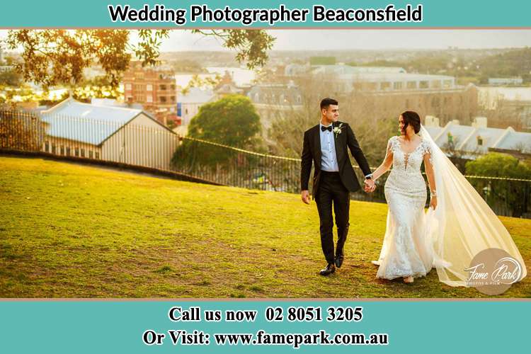 Bride and Groom walking up the hill Beaconsfield