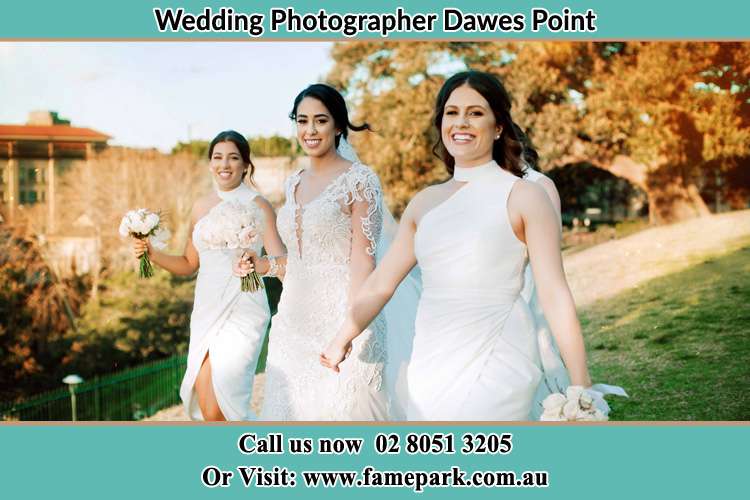 Bride walking down the hill Dawes Point