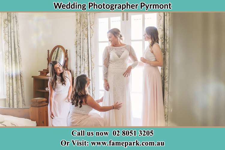 Bride preparing together with her bride's maids Pyrmont NSW 2009