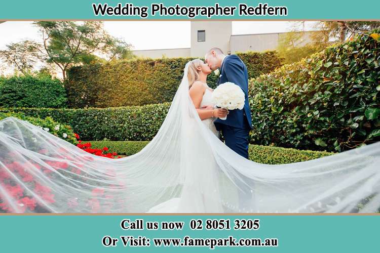 Bride and Groom kissed at the garden Redfern NSW 2016