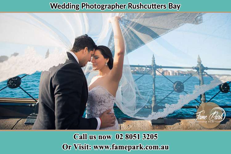 The bride and Groom at the shore Rushcutters Bay