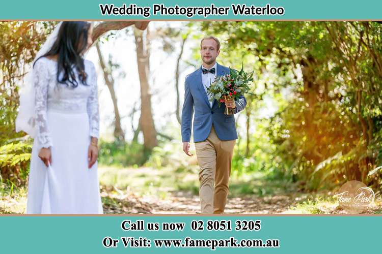 Groom bring Bouquet of flowers to the Bride Waterloo NSW 2017